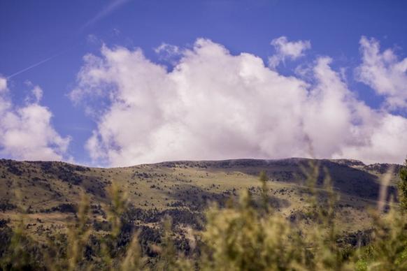 cloud daytime desert environment forest hill