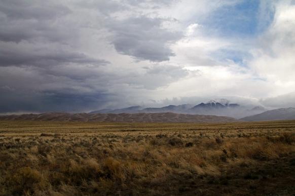 cloud desert dry field hill horizon landscape light