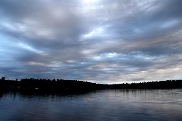 clouds sky water lake trees