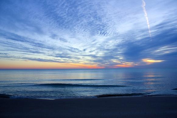 dawn over the horizon at harrington beach state park wisconsin