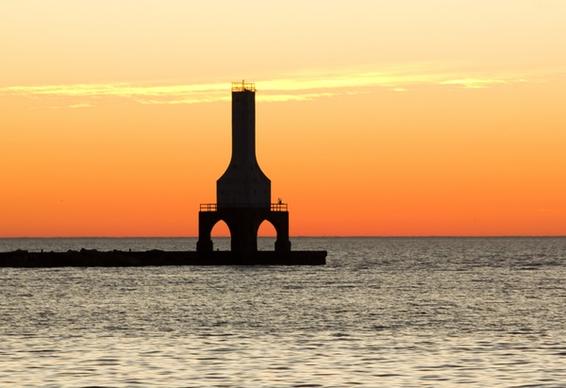 daybreak over the lighthouse at port washington wisconsin