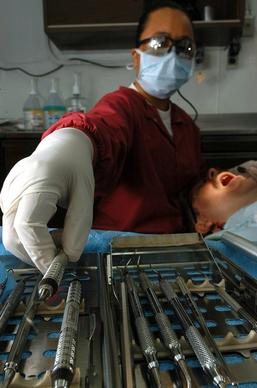 dental technician man hypodermics