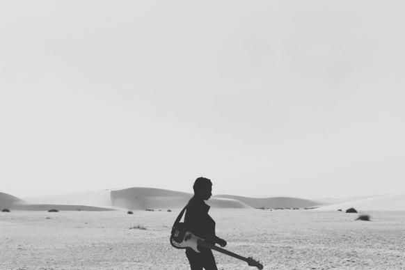 desert dry entertainment guitar music perform person