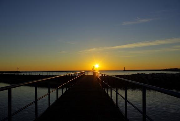 distant sunrise at port washington wisconsin