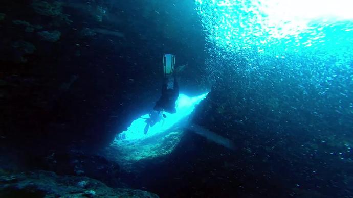 diver exploring deep ocean