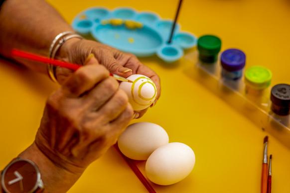 easter preparation picture closeup hand drawing eggs