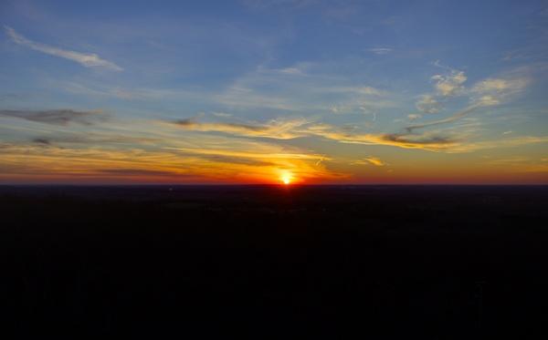 far off sunset at lapham peak state park wisconsin