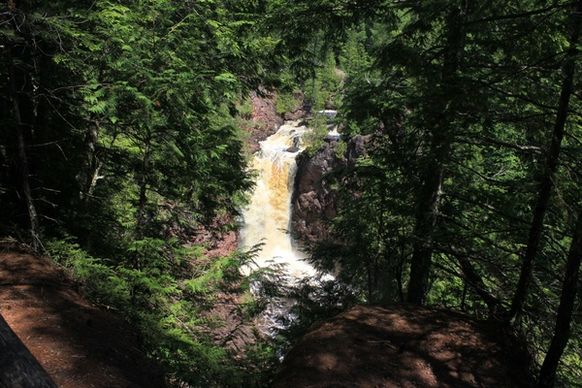 far view of brownstone falls at copper falls state park wisconsin