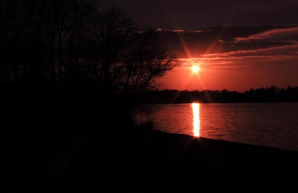far view of red sun at pike lake state park wisconsin