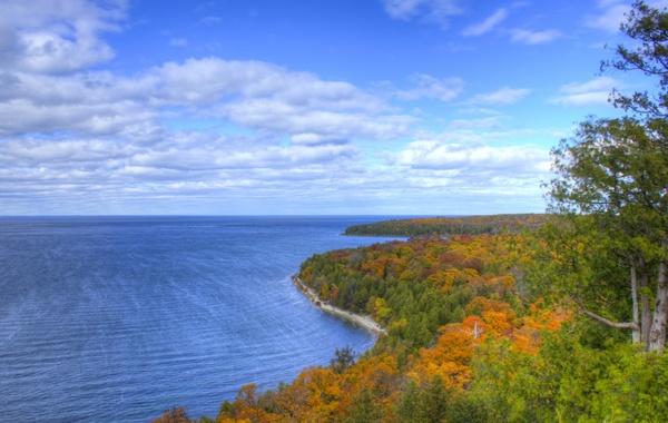 far view of the autumn shore at peninsula state park wisconsin