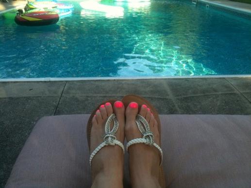 feet by the poolside