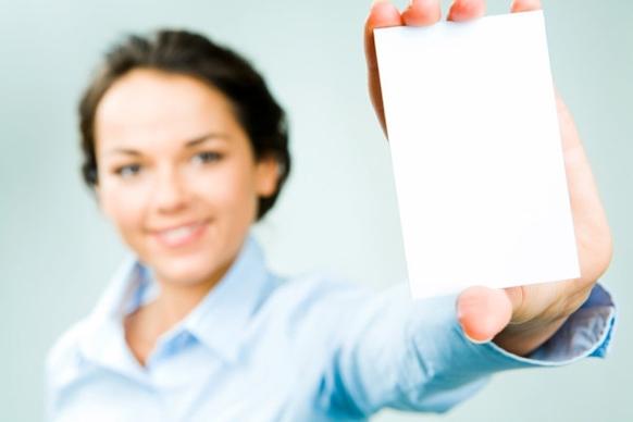 figure holding a blank business card highdefinition images