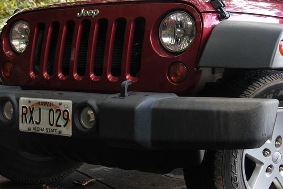 front grill of red jeep