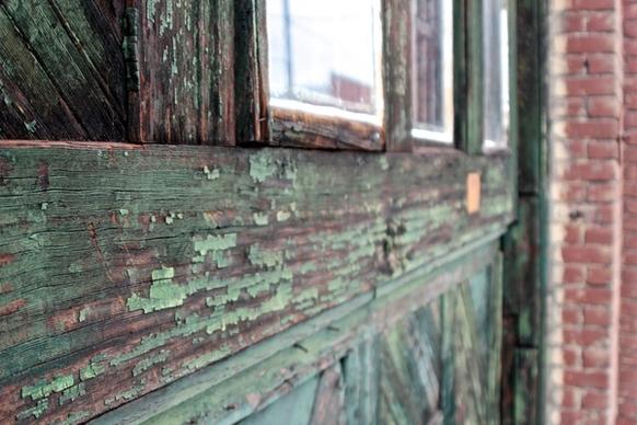green weather wood window frame