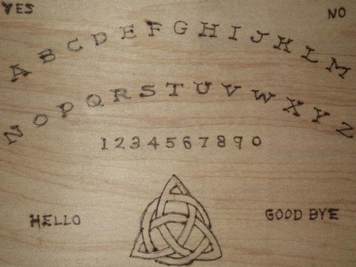 hand made ouija board close up