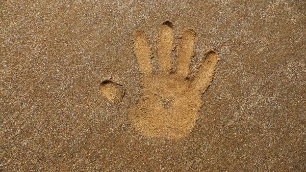 hand print in the sand