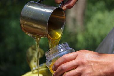 honey farming job picture dynamic liquid pouring closeup