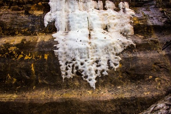 ice on the side of the rock at governor dodge state park wisconsin