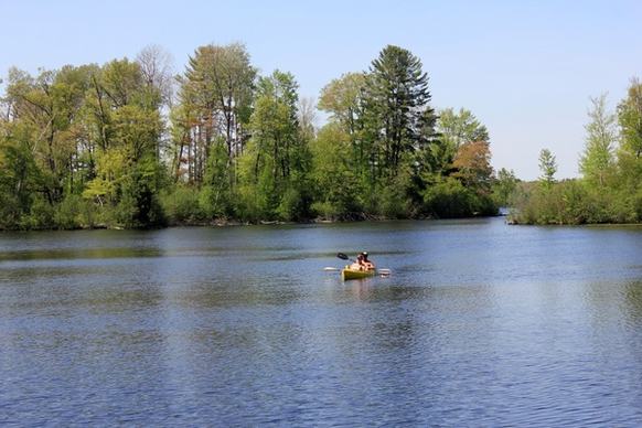 kayakers rowing in at governor thompson state park wisconsin