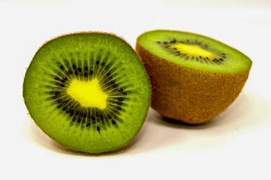 kiwi fruit backdrop picture closeup slices cut