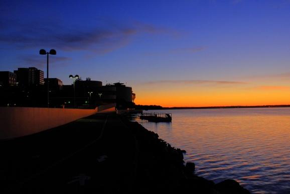 lake and shore view at dawn in madison wisconsin