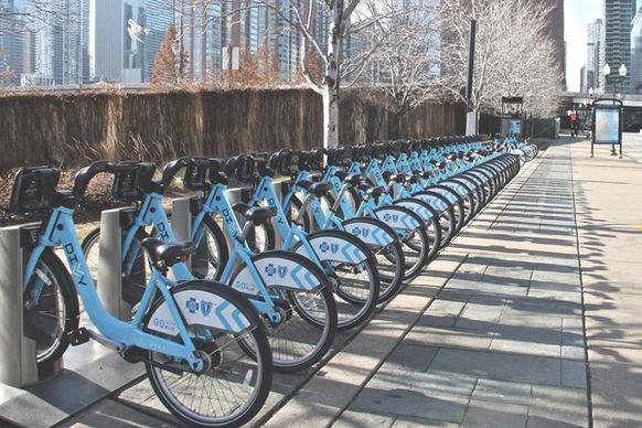 line of bicycles for rent on rack