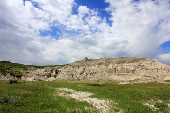 lots of clouds over the hills at white butte north dakota
