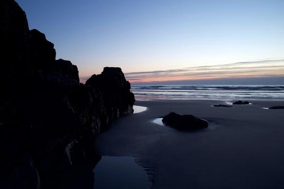 nature landscape beach sunrise ocean rocks sand