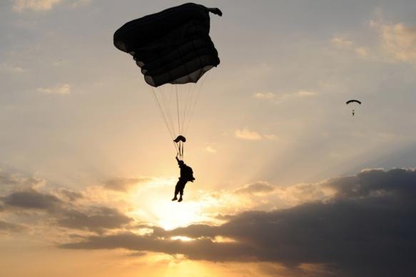 parachute parachuting person