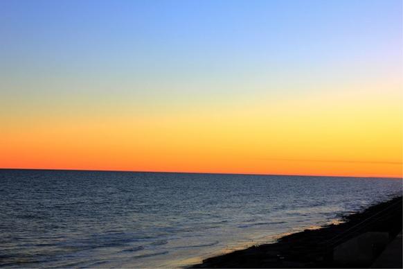 peaceful ocean at sunset at galveston texas