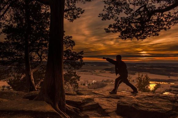 punching stance at dusk at gibraltar rock wisconsin free stock photo