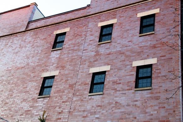 red brick building with 6 windows