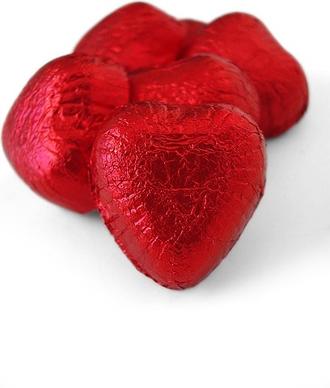 red heartshaped chocolate stock photo