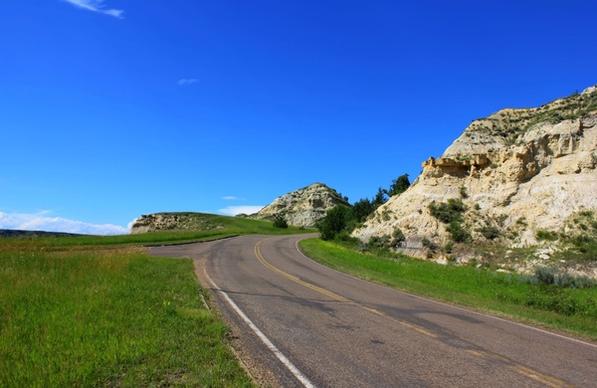roadway in the park at theodore roosevelt national park north dakota