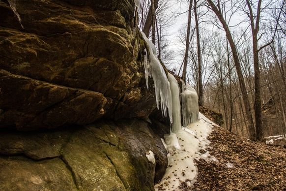 rock overhangs with ice at governor dodge state park wisconsin