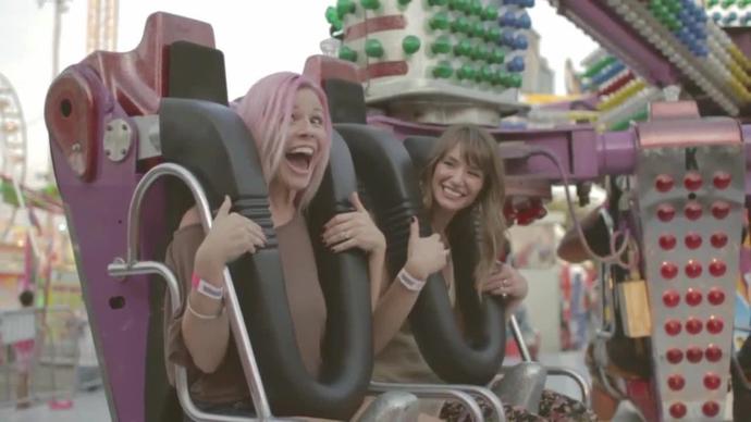 self video of excited friends in amusement park