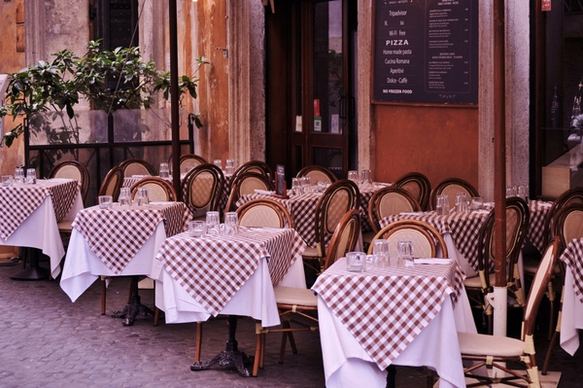 set tables in an italian restaurant