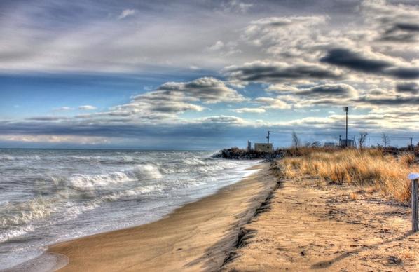 shoreline and clouds at illinois beach state park illinois