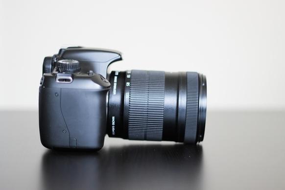 side view of dslr camera with zoom lens