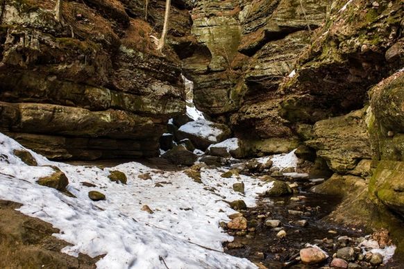 snow in the canyon at parfreys glen wisconsin