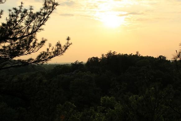 sun over hills at starved rock state park illinois