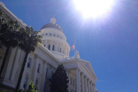sun over state capital government building