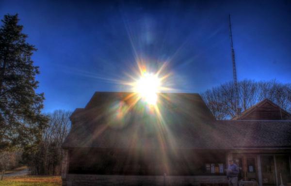 sun over visitor039s center at babbler state park missouri