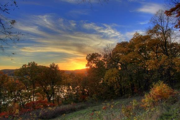 sunet over the autumn forest in perrot state park wisconsin