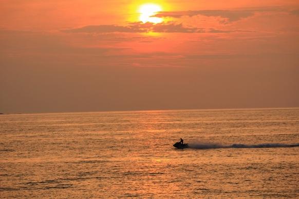 sunset boat sea