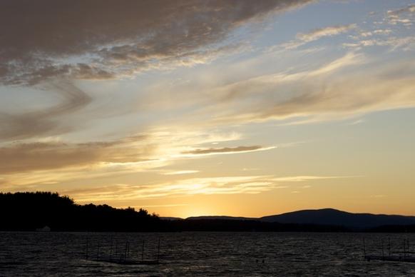 sunset clouds lake mountains