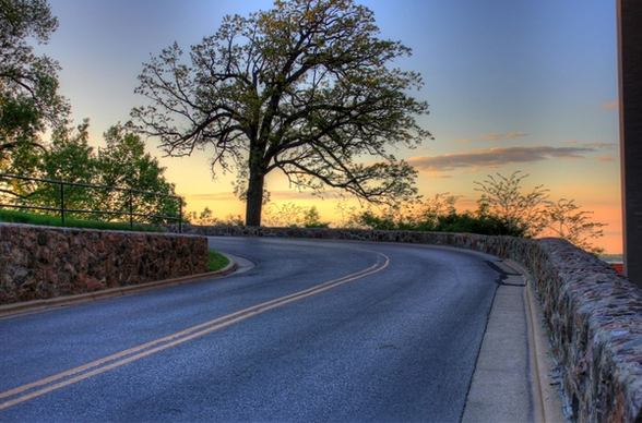 sunset on the curving road in madison wisconsin
