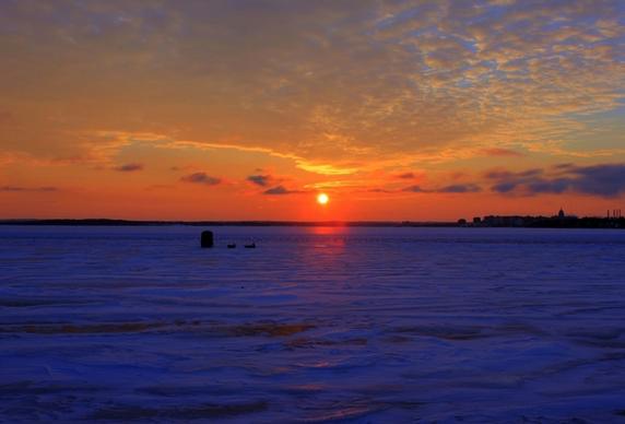 sunset over icy lake in madison wisconsin