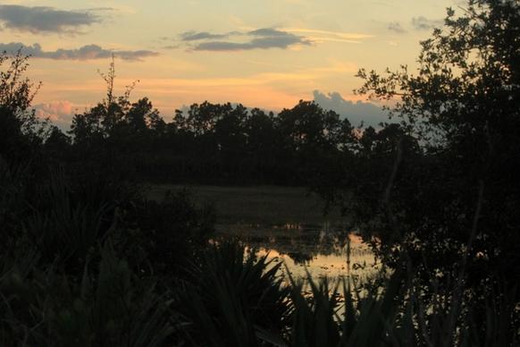 sunset over lake at sebastion river state park florida