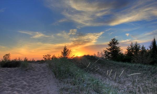 sunset over the dunes at pictured rocks national lakeshore michigan